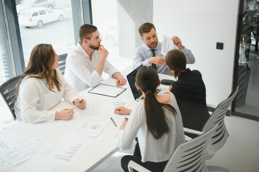 Corporate business team and in a meeting at modern office with big windows . high quality photo
